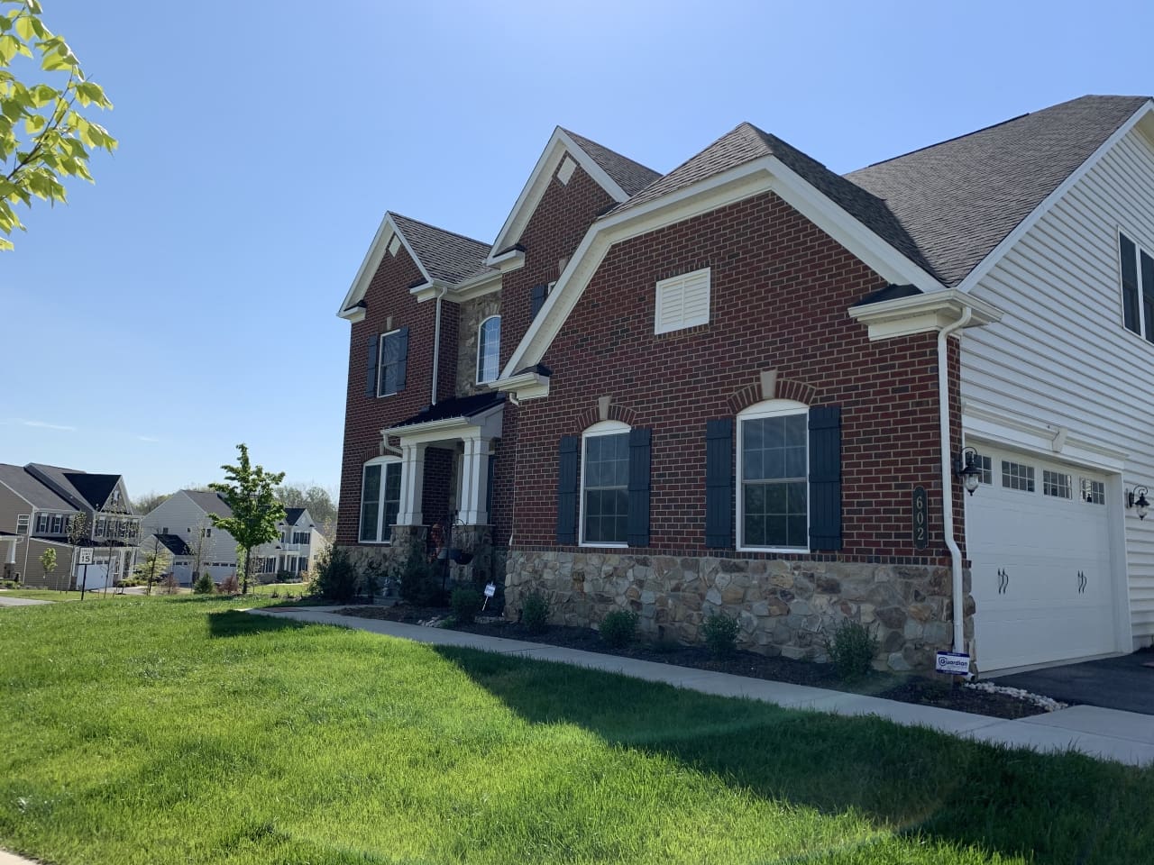 Brick Colonial with Brandywine Fieldstone Base